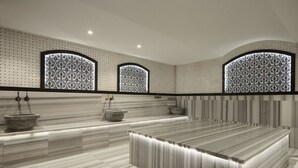 A modern bathroom with a marble vanity, three large windows with patterned glass, and a tiled floor. - Ramada by Wyndham Mersin (Mersin)