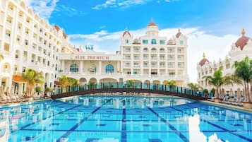 Indoor pool, outdoor pool, open 7:00 AM to 7:00 PM, pool umbrellas