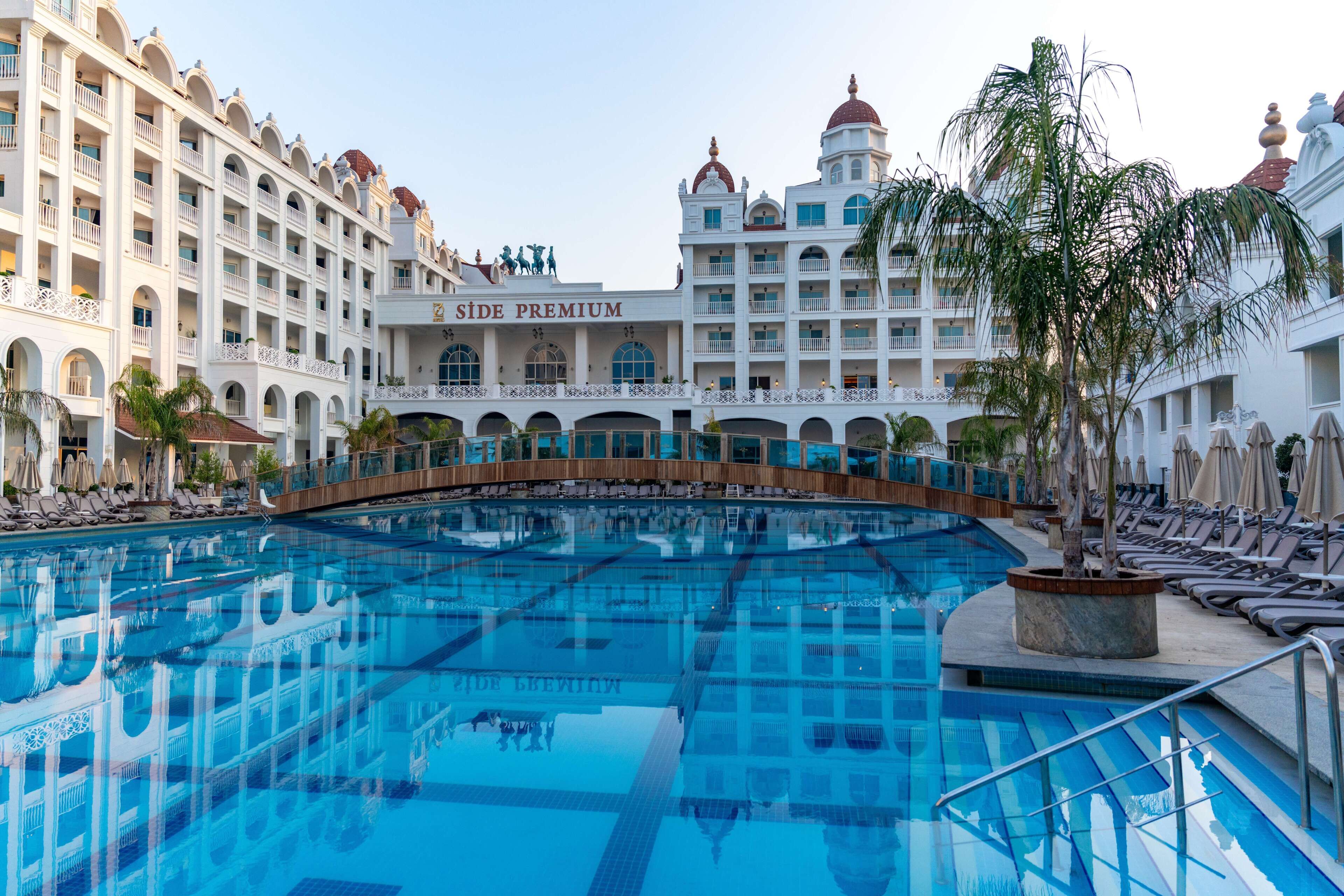 Indoor pool, outdoor pool, open 7:00 AM to 7:00 PM, pool umbrellas