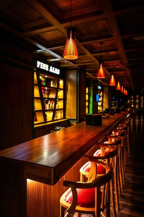3 bars/lounges, poolside bar, beach bar