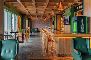 3 bars/lounges, poolside bar, beach bar