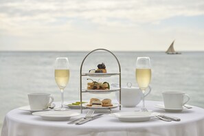 Breakfast, lunch, dinner served; local cuisine, sea views