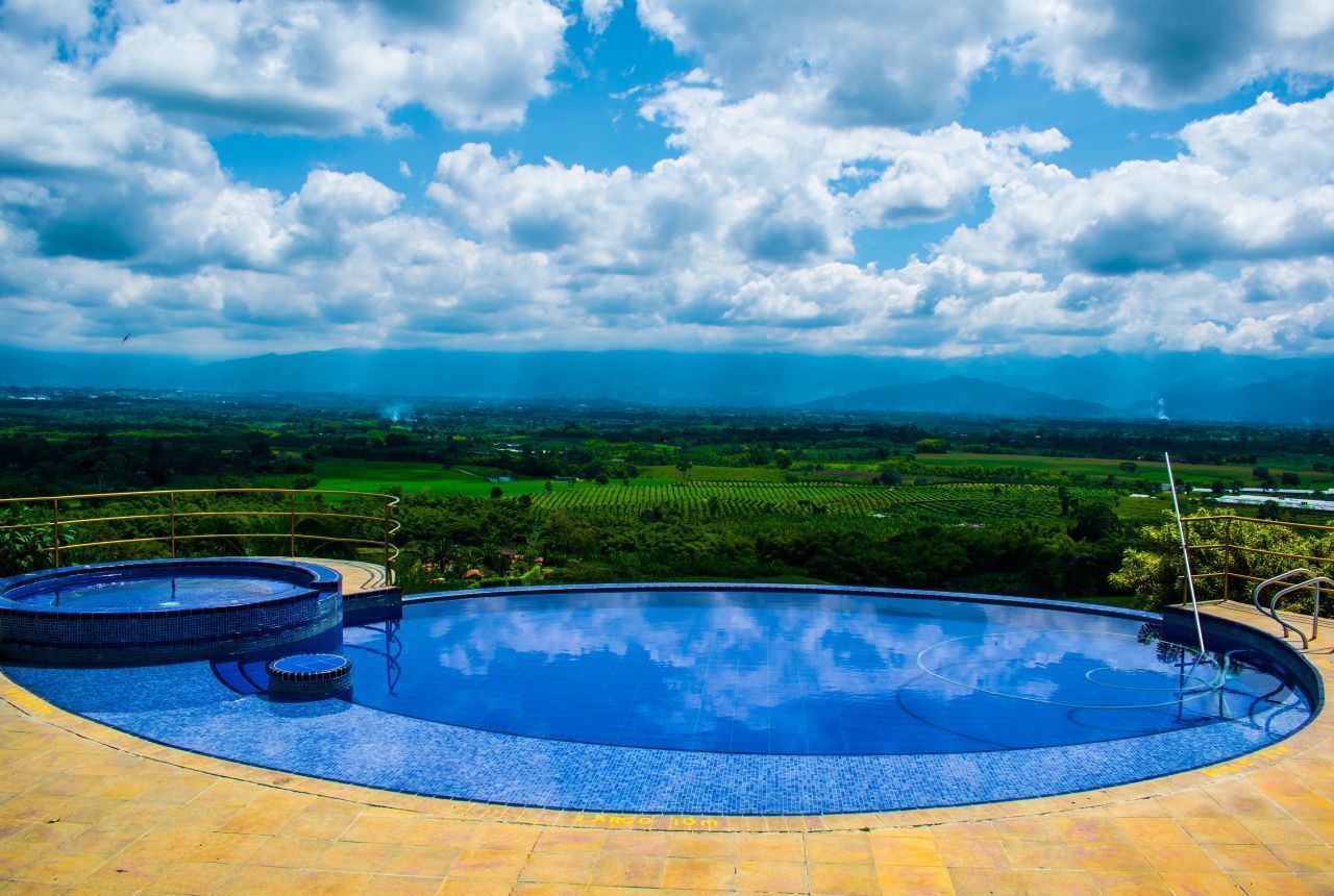 outdoor pool, pool umbrellas, pool loungers