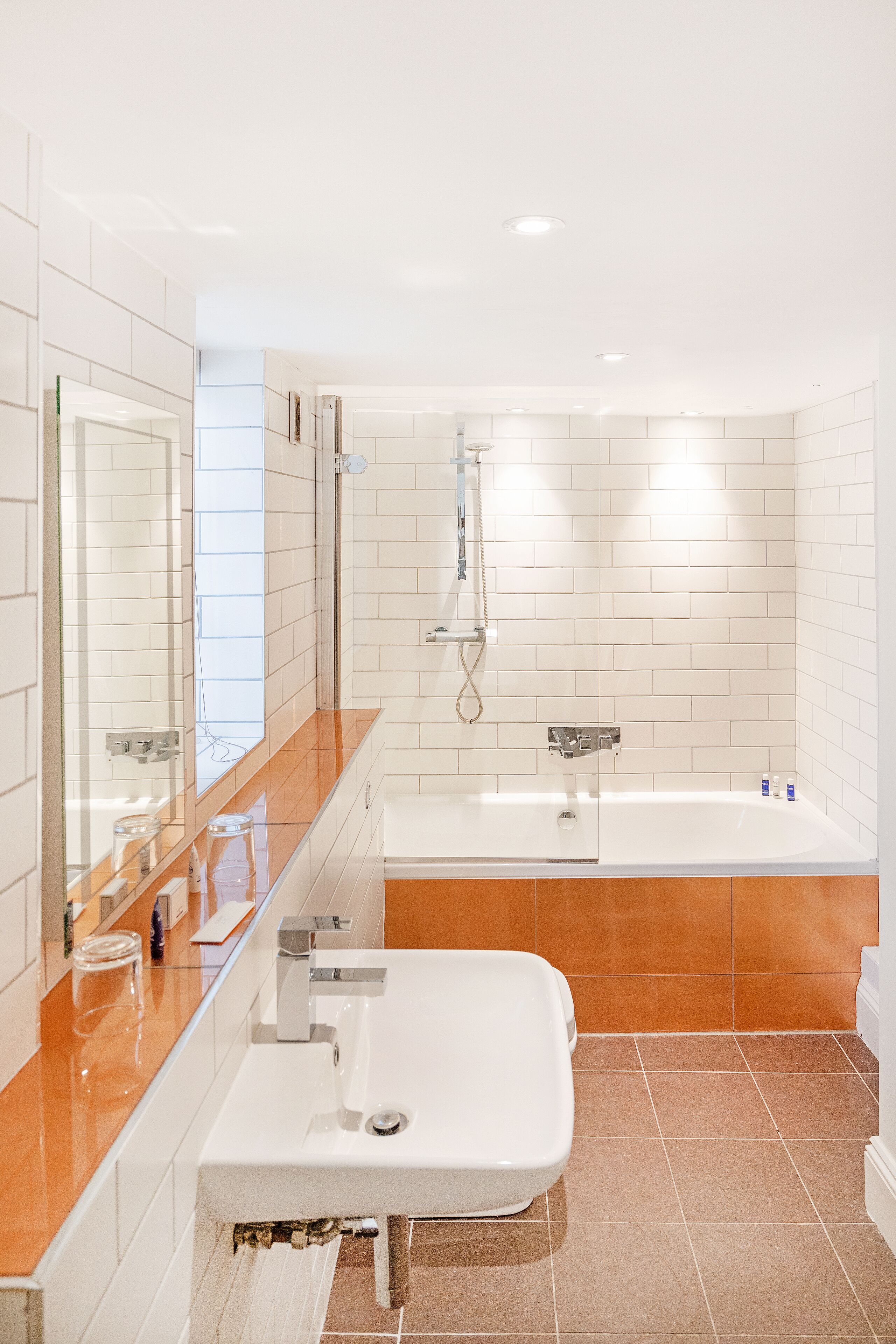 deluxe suite, 1 bedroom | bathroom | shower, rainfall showerhead, designer toiletries, hair dryer