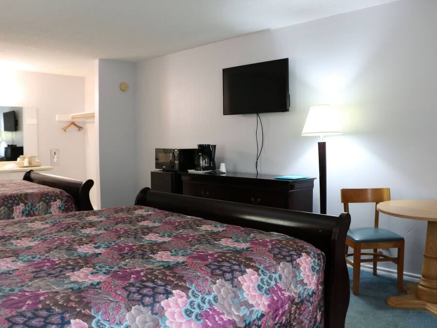 Traditional Double Room, 2 Queen Beds, Refrigerator & Microwave, Ground Floor | Free WiFi, bed sheets