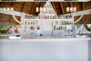 2 bars/lounges, poolside bar, beach bar