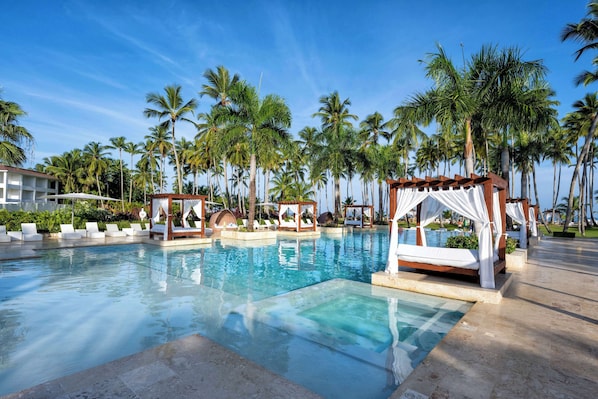 Outdoor pool, open 8 AM to 8 PM, free pool cabanas, pool loungers