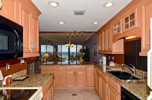 Standard Condo, 2 Bedrooms | Private kitchen | Full-size fridge, microwave, stovetop, dishwasher