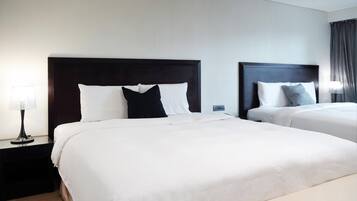 Deluxe Quadruple Room | Premium bedding, minibar, in-room safe, desk