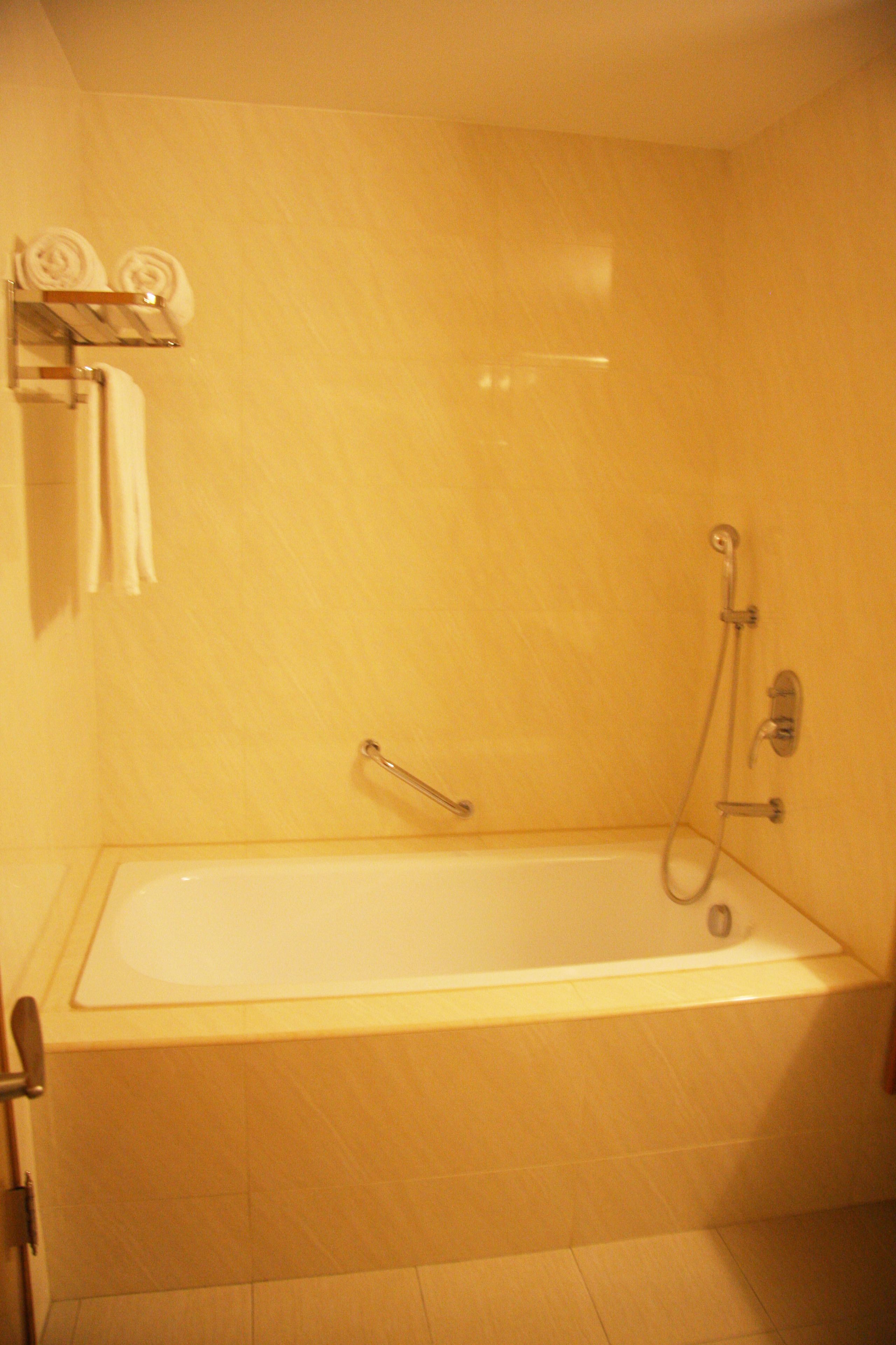 hair dryer, slippers, electronic bidet, towels