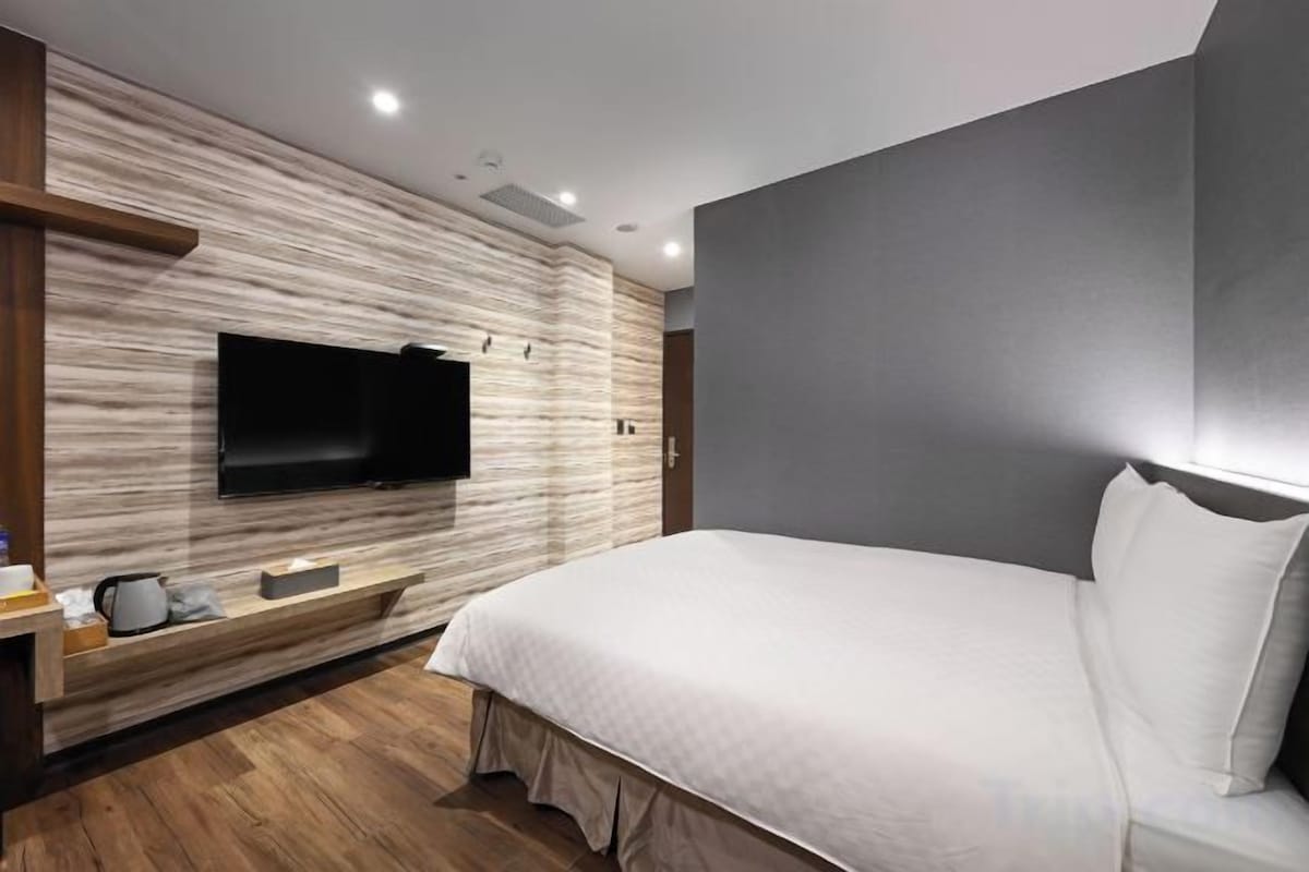 Down comforters, blackout drapes, WiFi (free), bed sheets