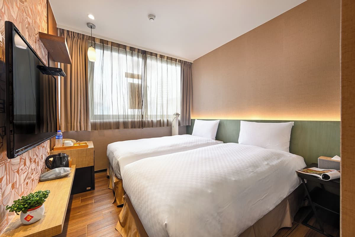 Deluxe Twin Room | 1 bedroom, down comforters, blackout drapes, free WiFi