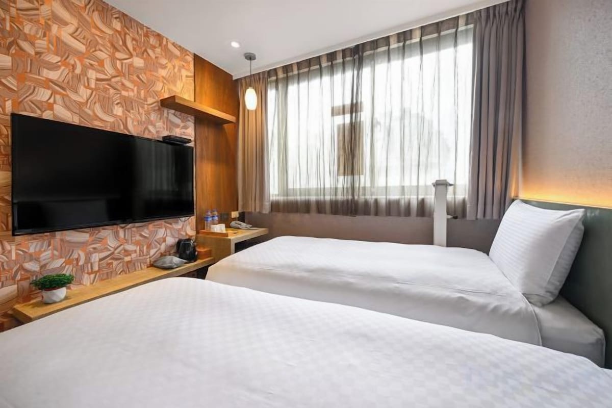 Down comforters, blackout drapes, WiFi (free), bed sheets