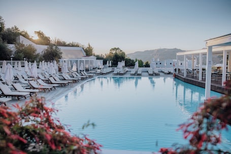 Indoor pool, outdoor pool, open 10:00 AM to 6:00 PM, pool umbrellas. Lindos Village Resort & Spa - Adults Only
