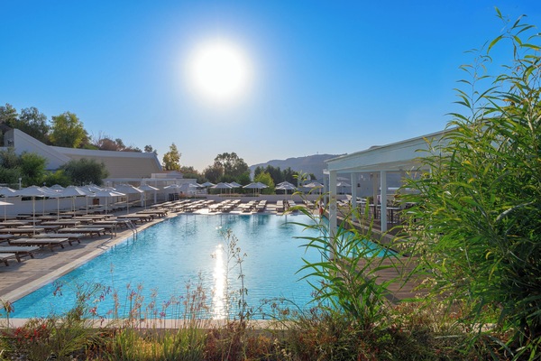Indoor pool, outdoor pool, open 10:00 AM to 7:00 PM, pool umbrellas
