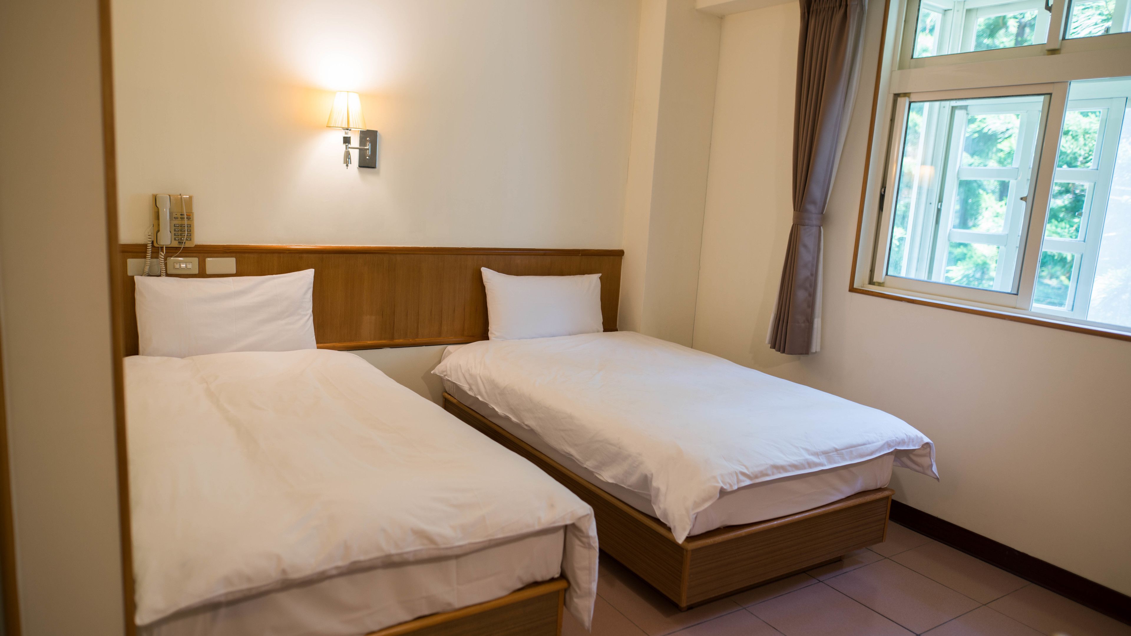 economy double room, 1 bedroom, poolside | 1 bedroom, down duvets, in-room safe, blackout curtains