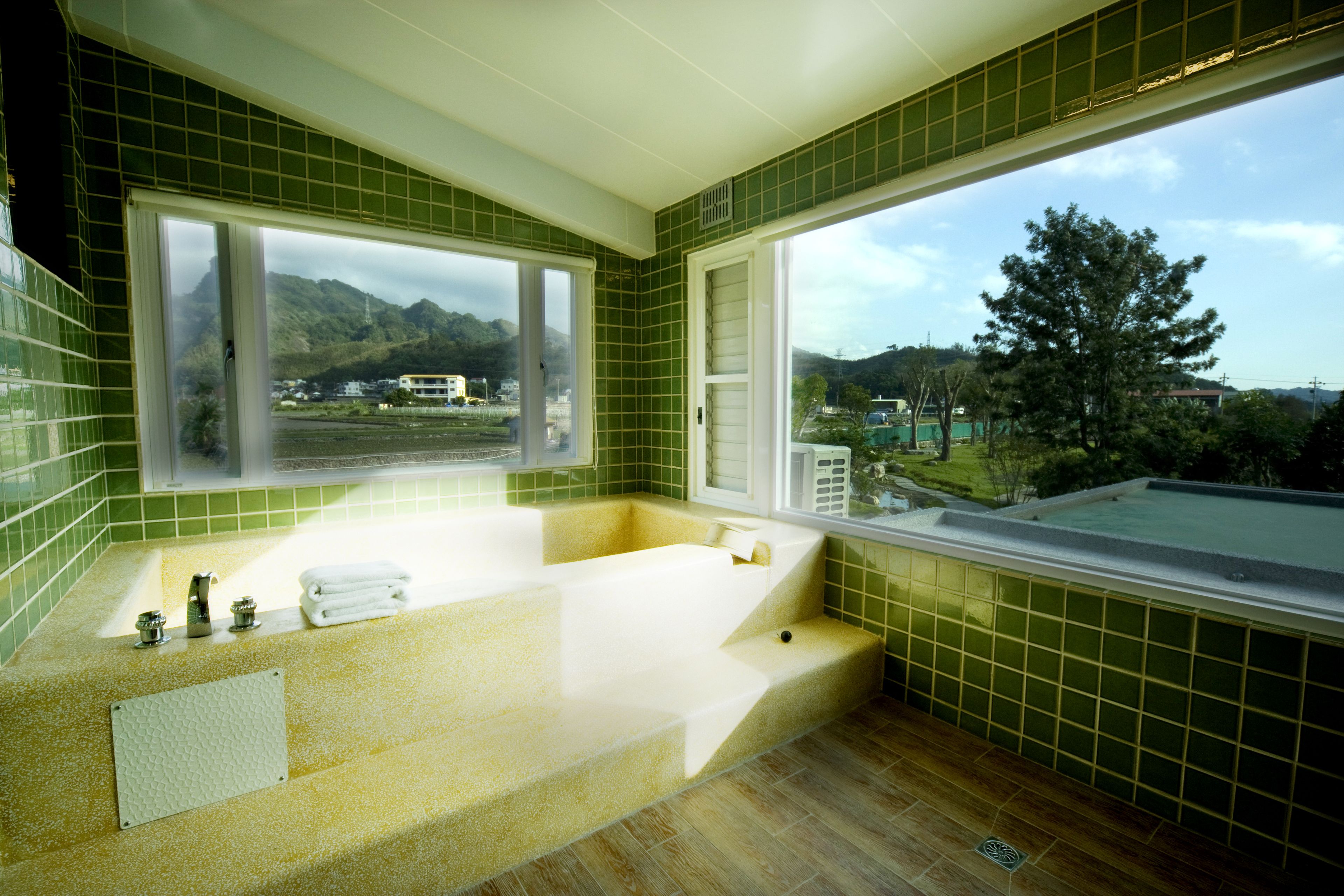 deluxe quadruple room, 2 bedrooms | bathroom | separate bathtub and shower, deep-soaking bathtub, free toiletries