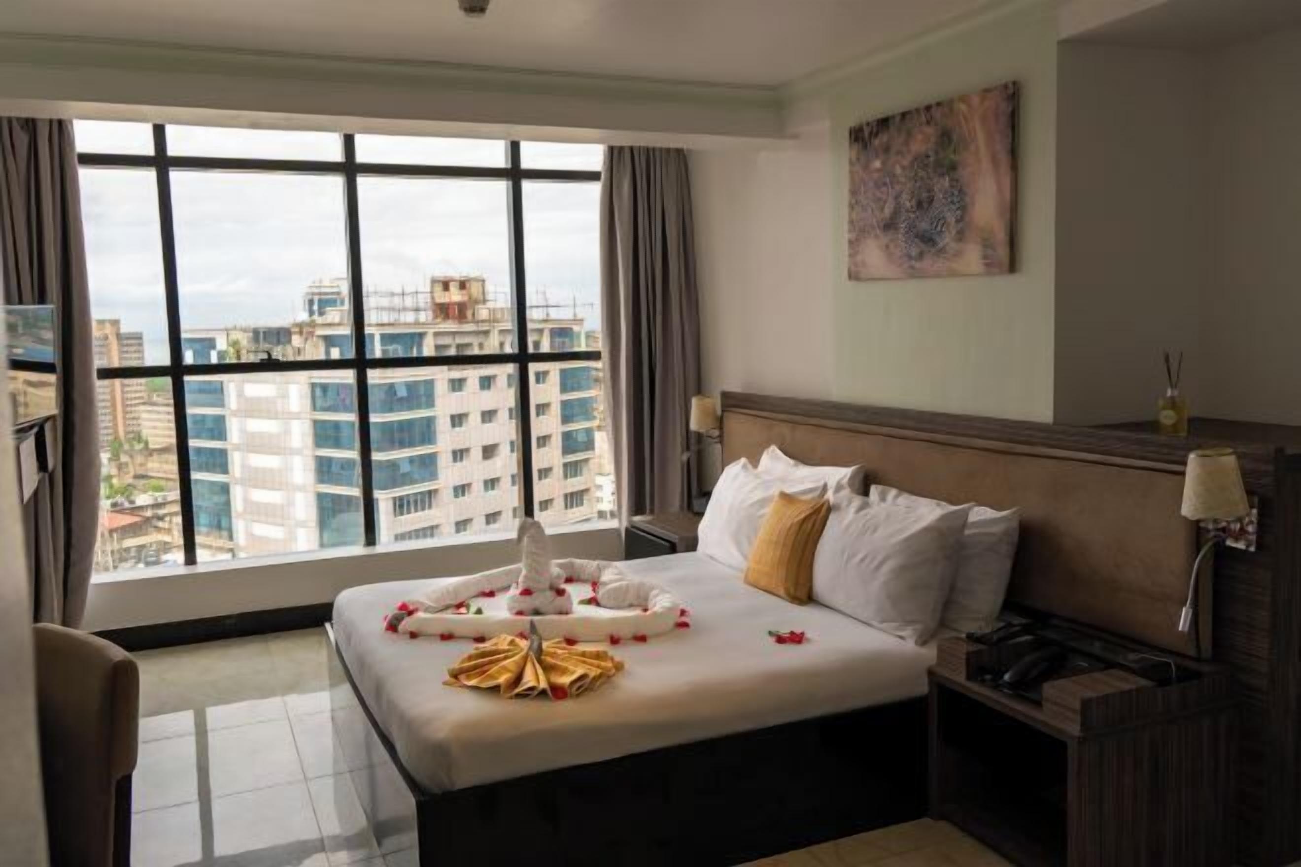 Hypo-allergenic bedding, minibar, in-room safe, desk