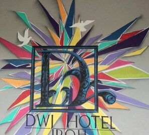 A colorful logo with a stylized 'D' and 'W' for DWI Hotel. - DWJ Hotel (Ipoh)