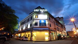 A hotel with a sign reading "DWJ HOTEL" and a contact number. - DWJ Hotel (Ipoh)