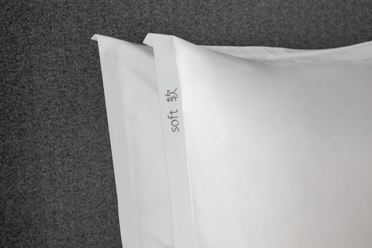A white envelope with the text "soft" visible on it.