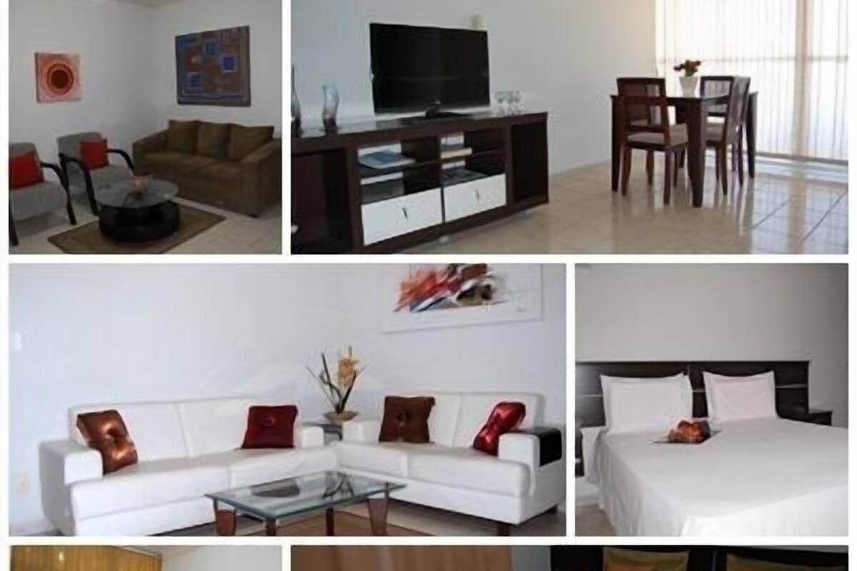 Senior appartement, 2 slaapkamers, 2 badkamers, uitzicht op stad | Woonruimte | Een ledtelevisie
