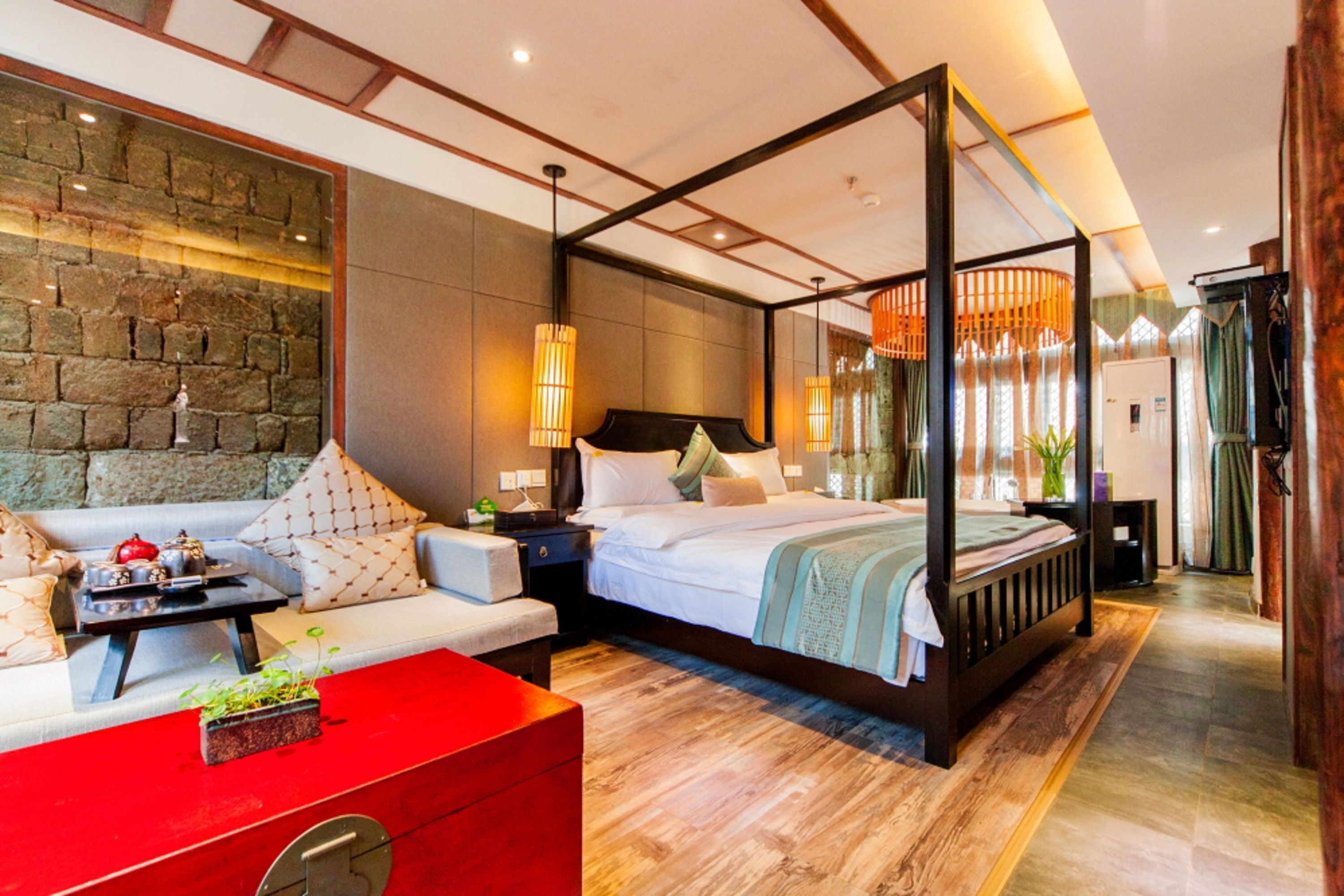 suite with garden view | premium bedding, desk, blackout curtains, soundproofing