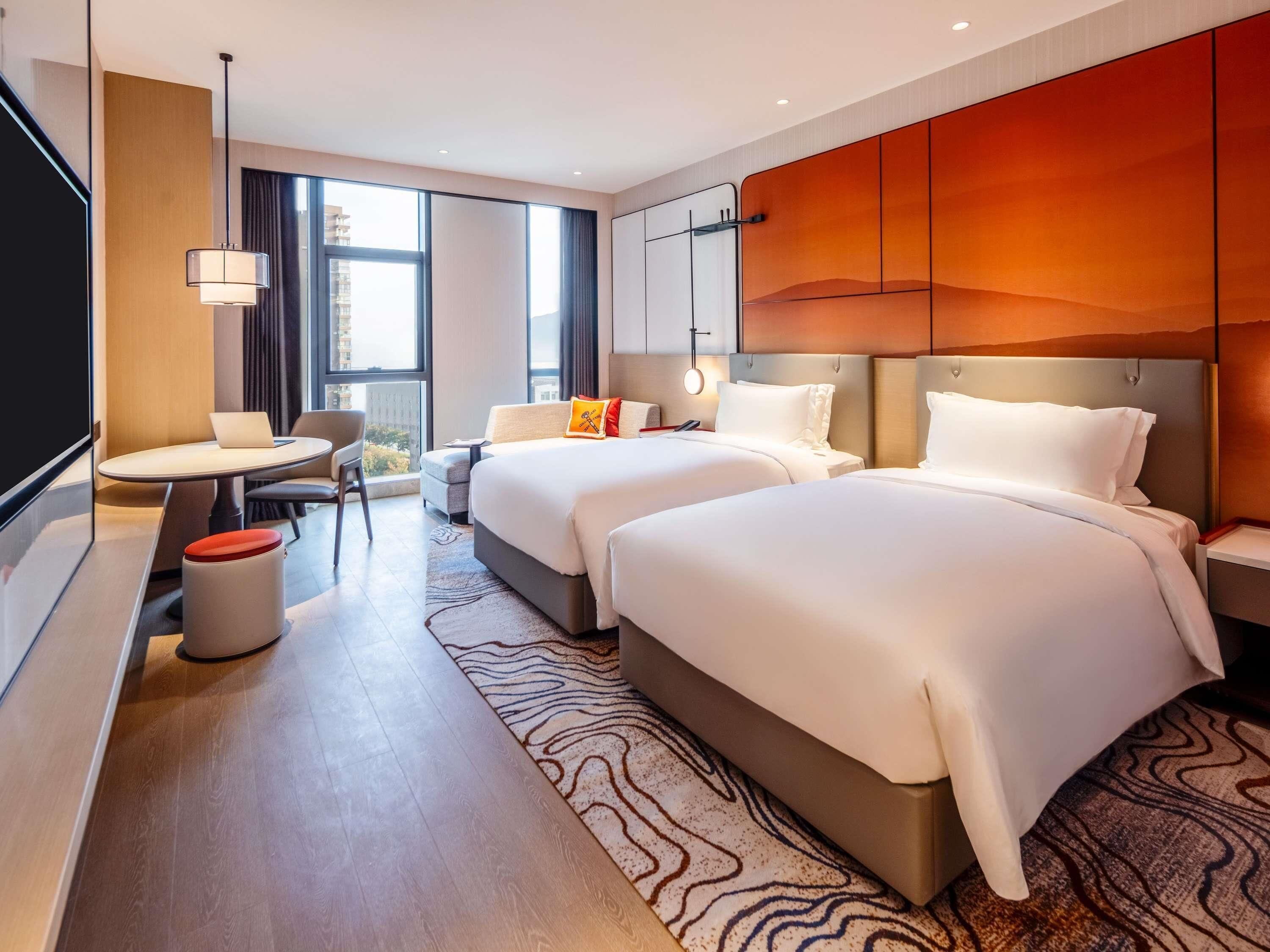 Down comforters, in-room safe, laptop workspace, blackout drapes