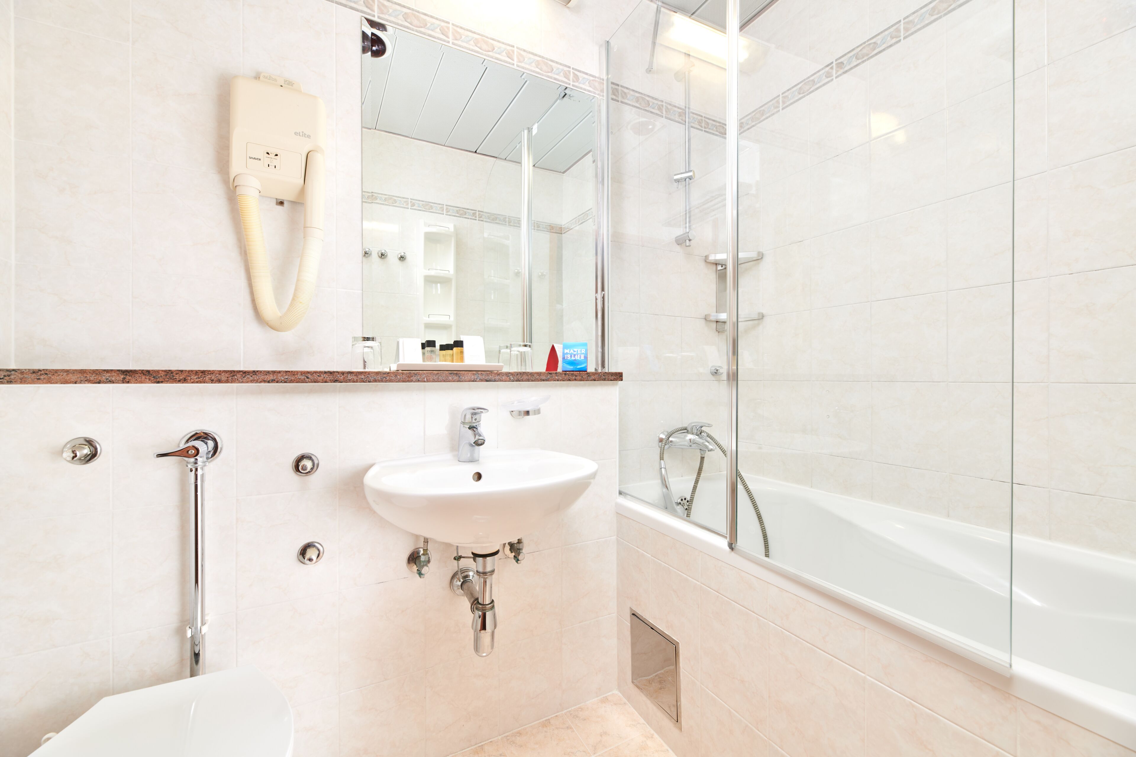 family room with balcony - sea side | bathroom | bathtub, free toiletries, hair dryer, towels