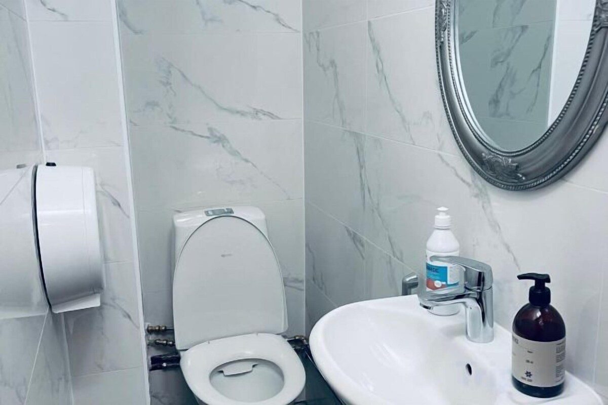 Hair dryer, slippers, towels, soap