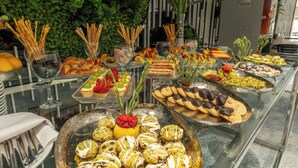 A buffet with various food items and desserts. - Teymur Continental Hotel (Gaziantep)