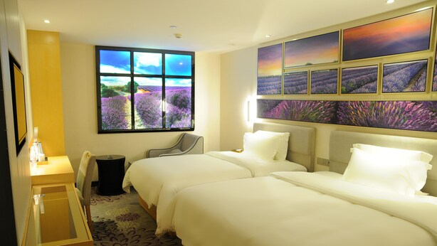 Family Room | Premium bedding, in-room safe, desk, blackout drapes - Tianyu Hotel (Guangzhou)