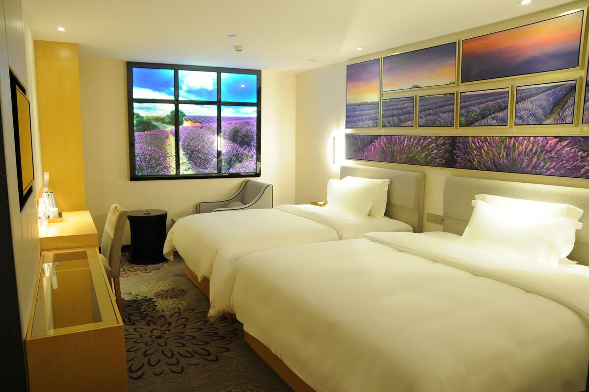 Family Room | Premium bedding, in-room safe, desk, blackout drapes