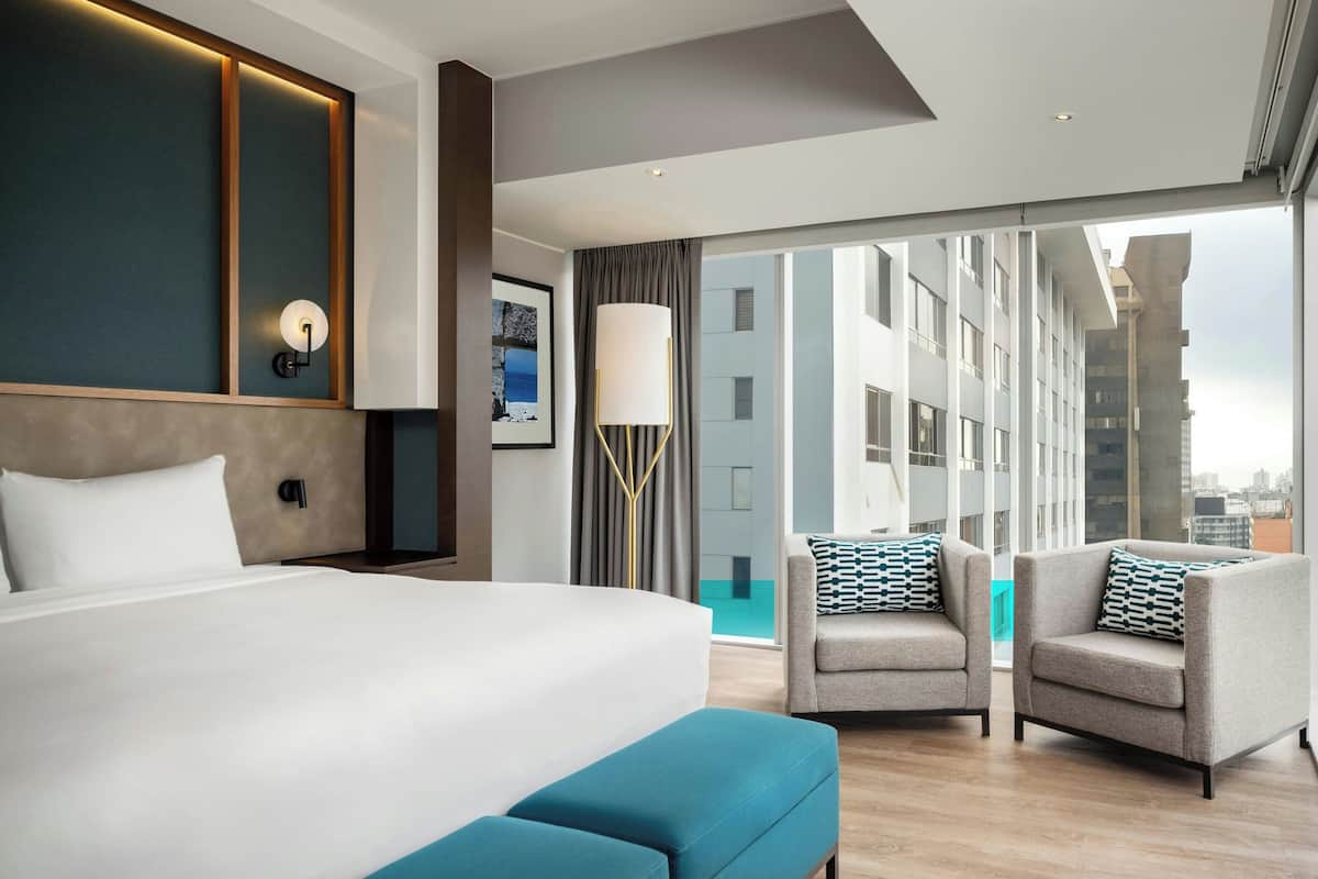 panoramic suite, 1 bedroom, non smoking, city view | 1 bedroom, minibar, in-room safe, desk