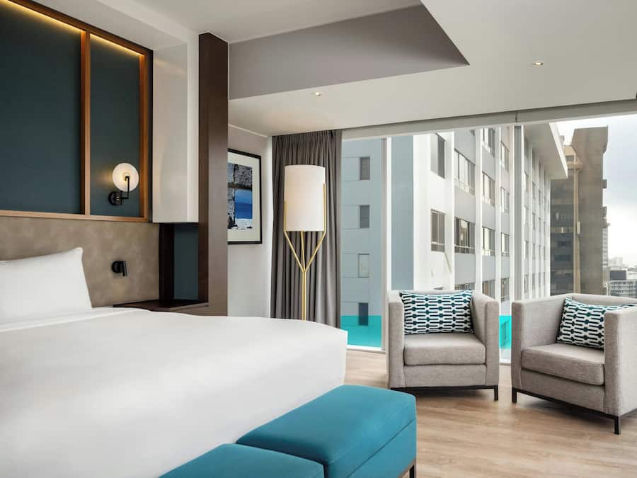 Panoramic Suite, 1 Bedroom, City View | Minibar, in-room safe, desk, soundproofing