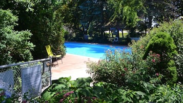 Seasonal outdoor pool, open 9 AM to 8 PM, pool loungers