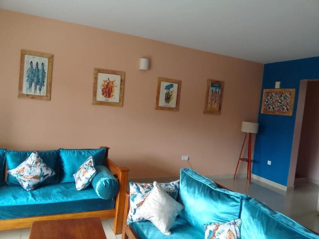 Basic Apartment, Pool View | Living area | Flat-screen TV
