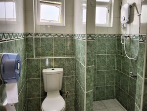 Basic Apartment, Pool View | Bathroom | Shower, free toiletries, hair dryer, slippers - Nightingale Apartments (Mombasa)