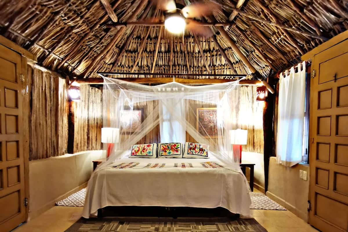 design cabin, 1 king bed, non smoking, kitchenette | premium bedding, in-room safe, individually decorated