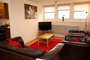 En 42-tommers Flatskjerm-TV med digitale kanaler samt TV