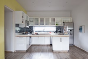 Family Suite, 2 Bedrooms, Kitchen, Tower (Price for 4 persons) | Private kitchen | Full-size fridge, microwave, stovetop, coffee/tea maker