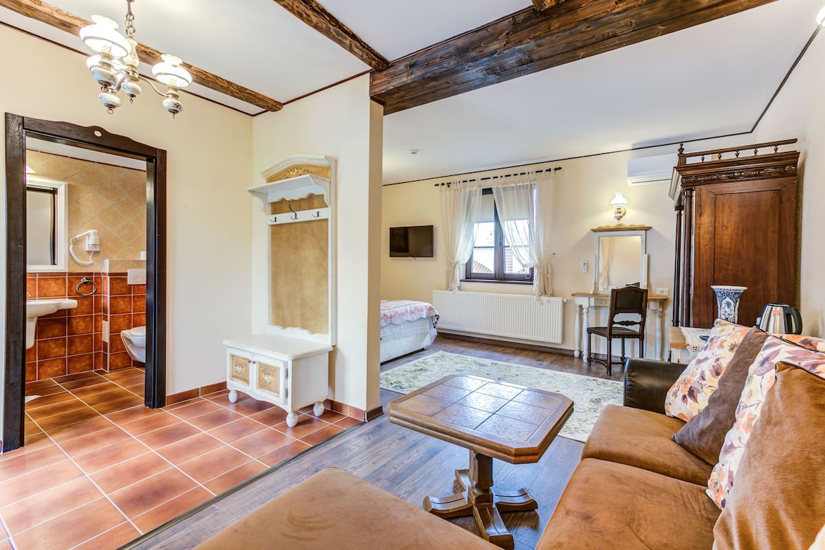 executive room, balcony | living area | 81-inch flat-screen tv with cable channels, tv, ping pong