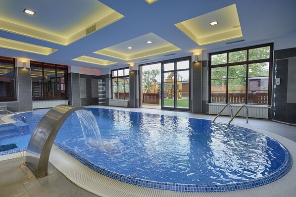 Indoor pool, seasonal outdoor pool, pool umbrellas, sun loungers