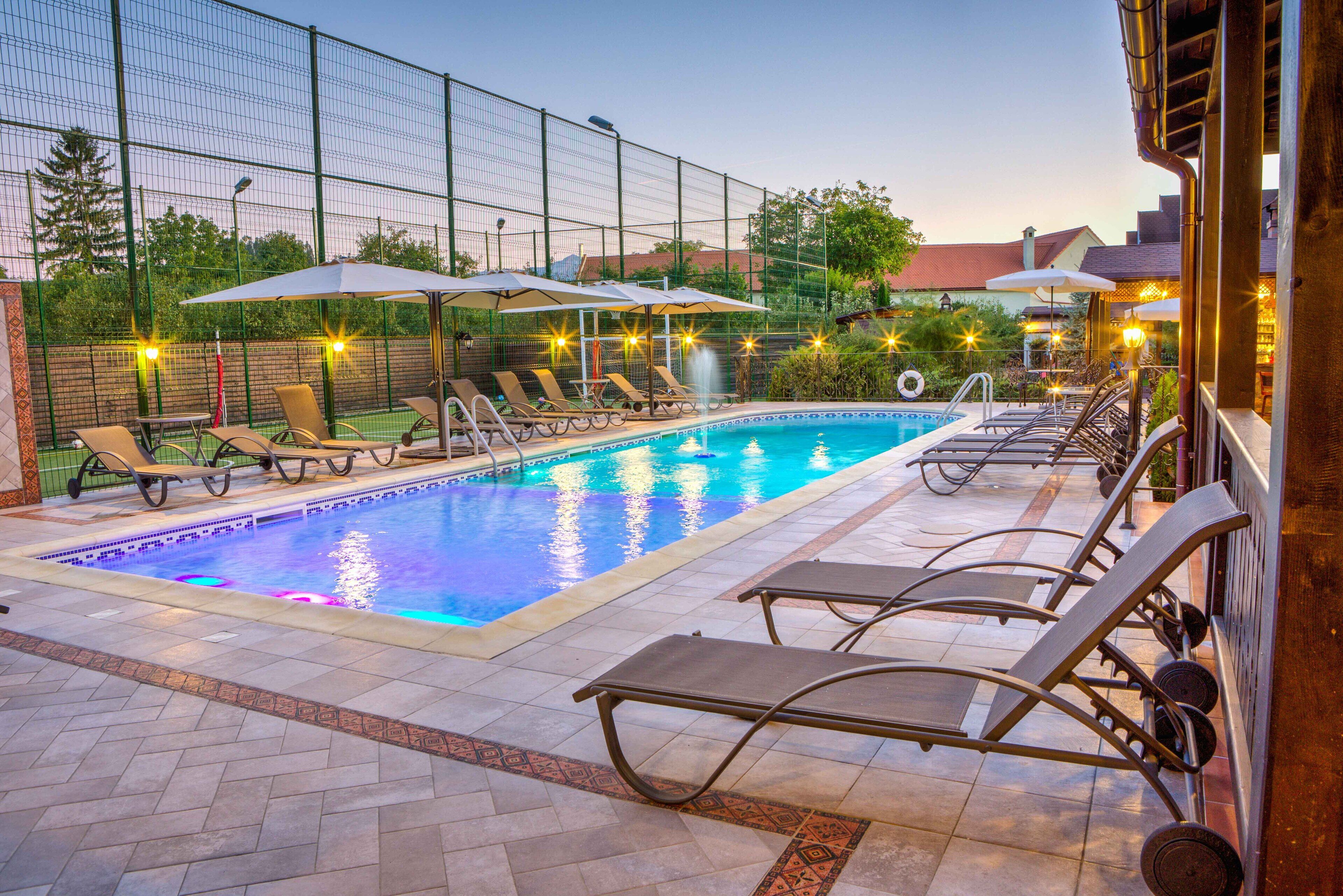 indoor pool, seasonal outdoor pool, pool umbrellas, pool loungers