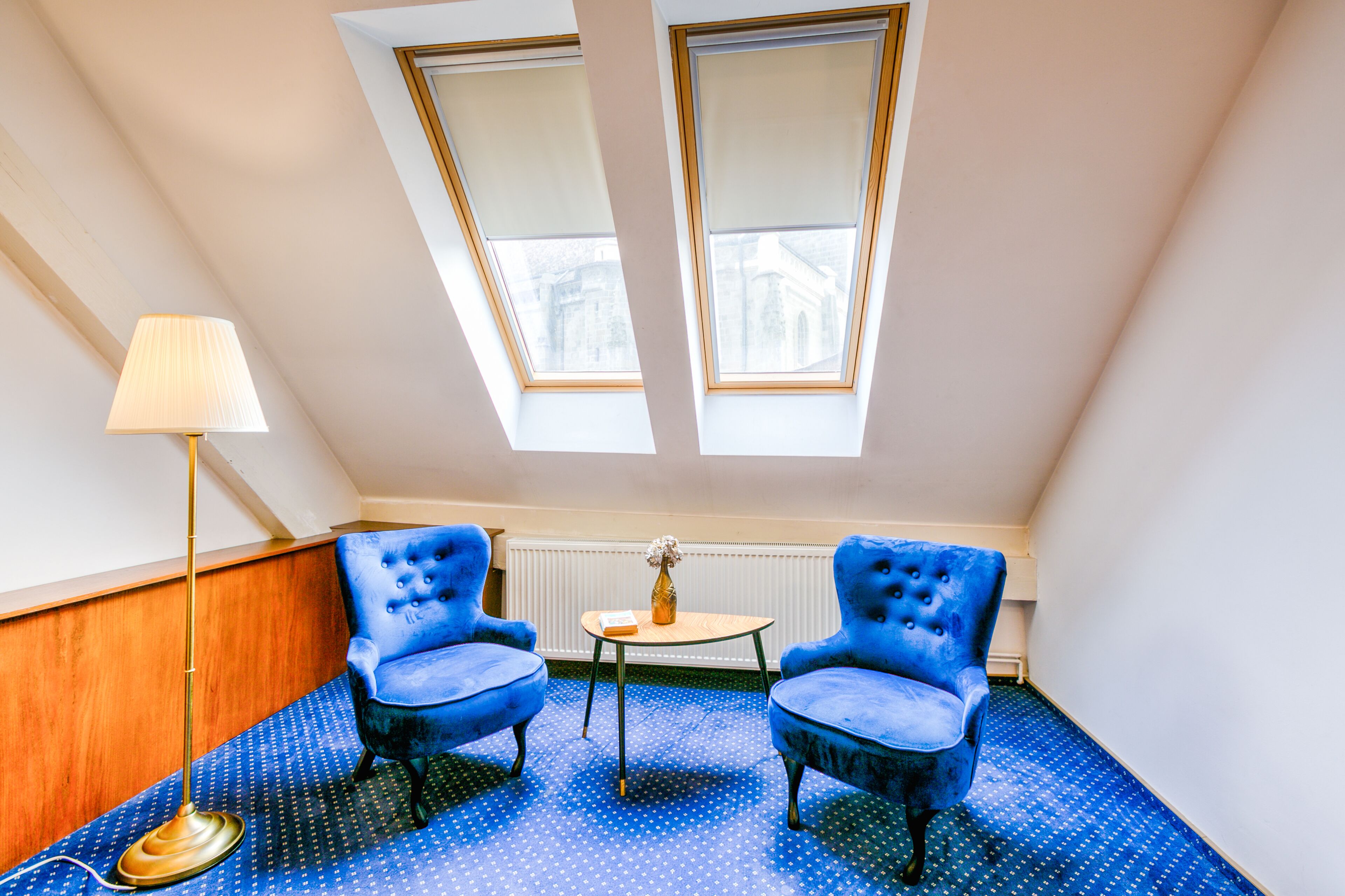 deluxe double or twin room (black church view) | living area | 32-inch flat-screen tv with cable channels, tv