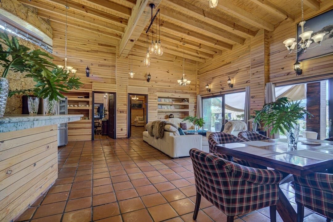 suite capricci, garden and pool view | living area | 21-inch tv with satellite channels