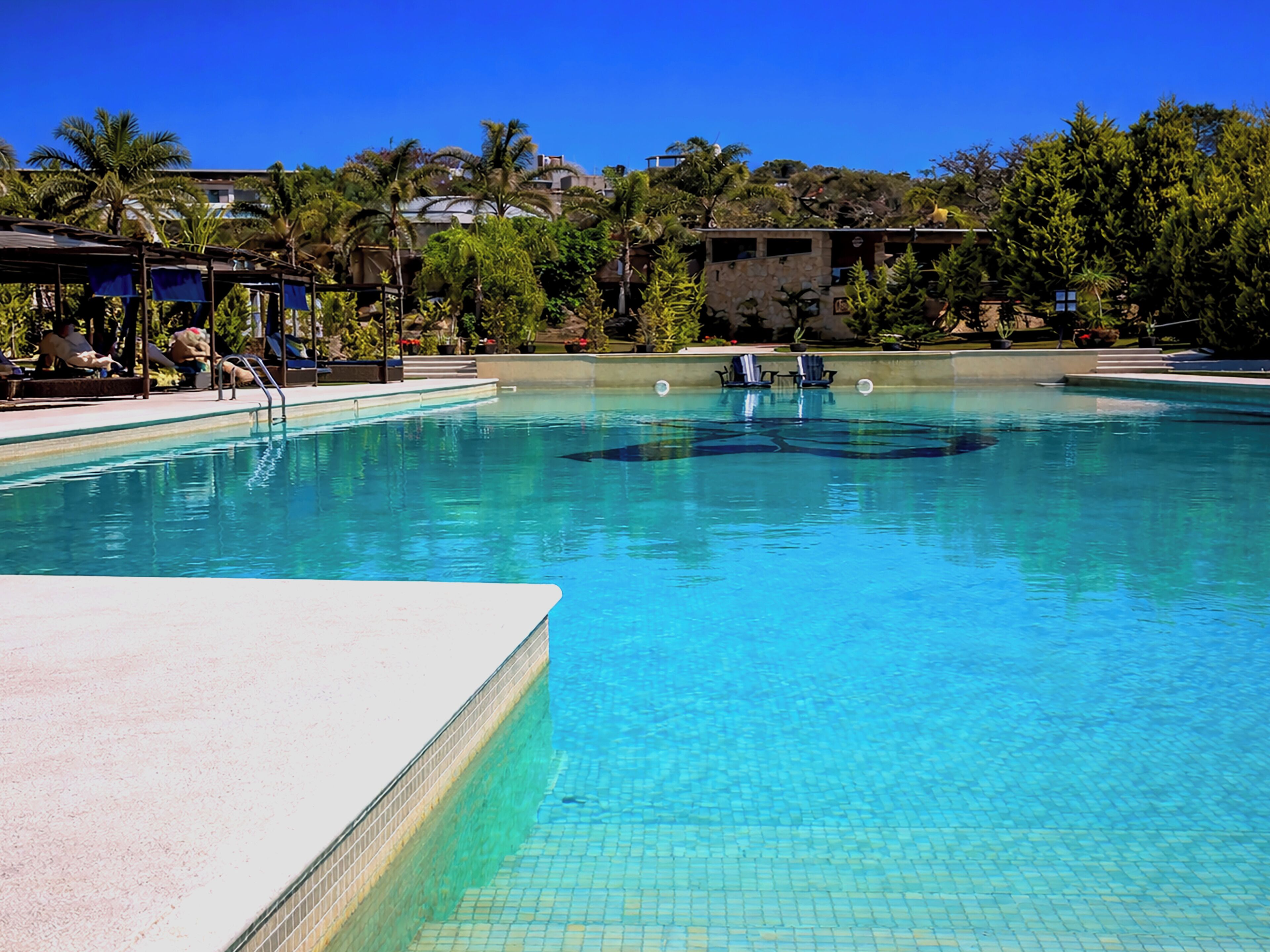 Outdoor pool, open 10:00 AM to 7:00 PM, sun loungers