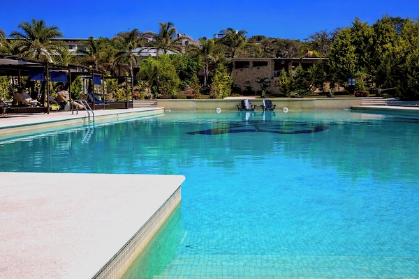 Outdoor pool, open 10:00 AM to 7:00 PM, sun loungers