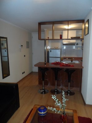 Apartamento, 2 quartos | Área de estar