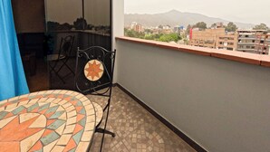 Superior Suite | Blackout drapes, iron/ironing board, WiFi (free), bed sheets - Hotel Esencia Suites (Lima)